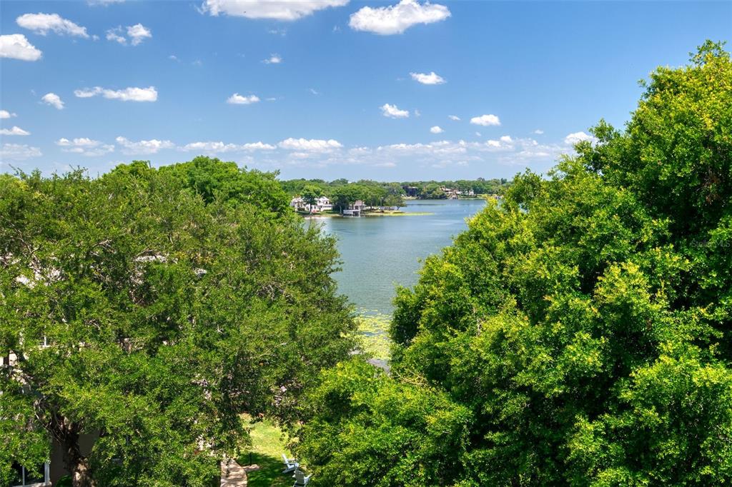 106 South Interlachen Avenue, Unit 518 Winter Park, FL 32789 - Photo 11 of 58 a view of lake from outdoor space
