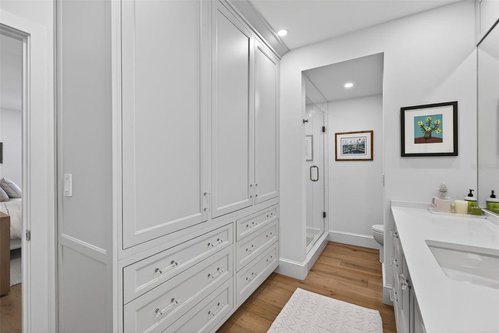 106 South Interlachen Avenue, Unit 518 Winter Park, FL 32789 - Photo 37 of 58 a view of a hallway to a closet and wooden floor