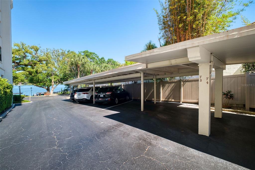 106 South Interlachen Avenue, Unit 518 Winter Park, FL 32789 - Photo 50 of 58 a car parked in front of building