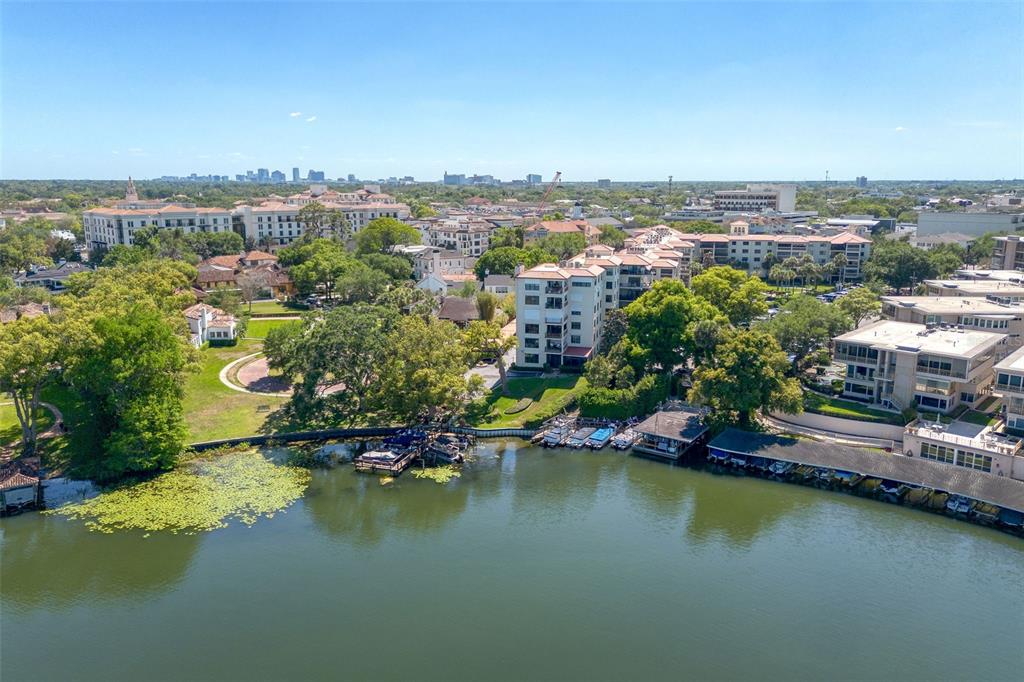 106 South Interlachen Avenue, Unit 518 Winter Park, FL 32789 - Photo 51 of 58 an aerial view of a houses with a lake view