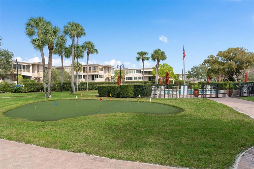 106 South Interlachen Avenue, Unit 518 Winter Park, FL 32789 - Photo 54 of 58 a view of a park with palm trees
