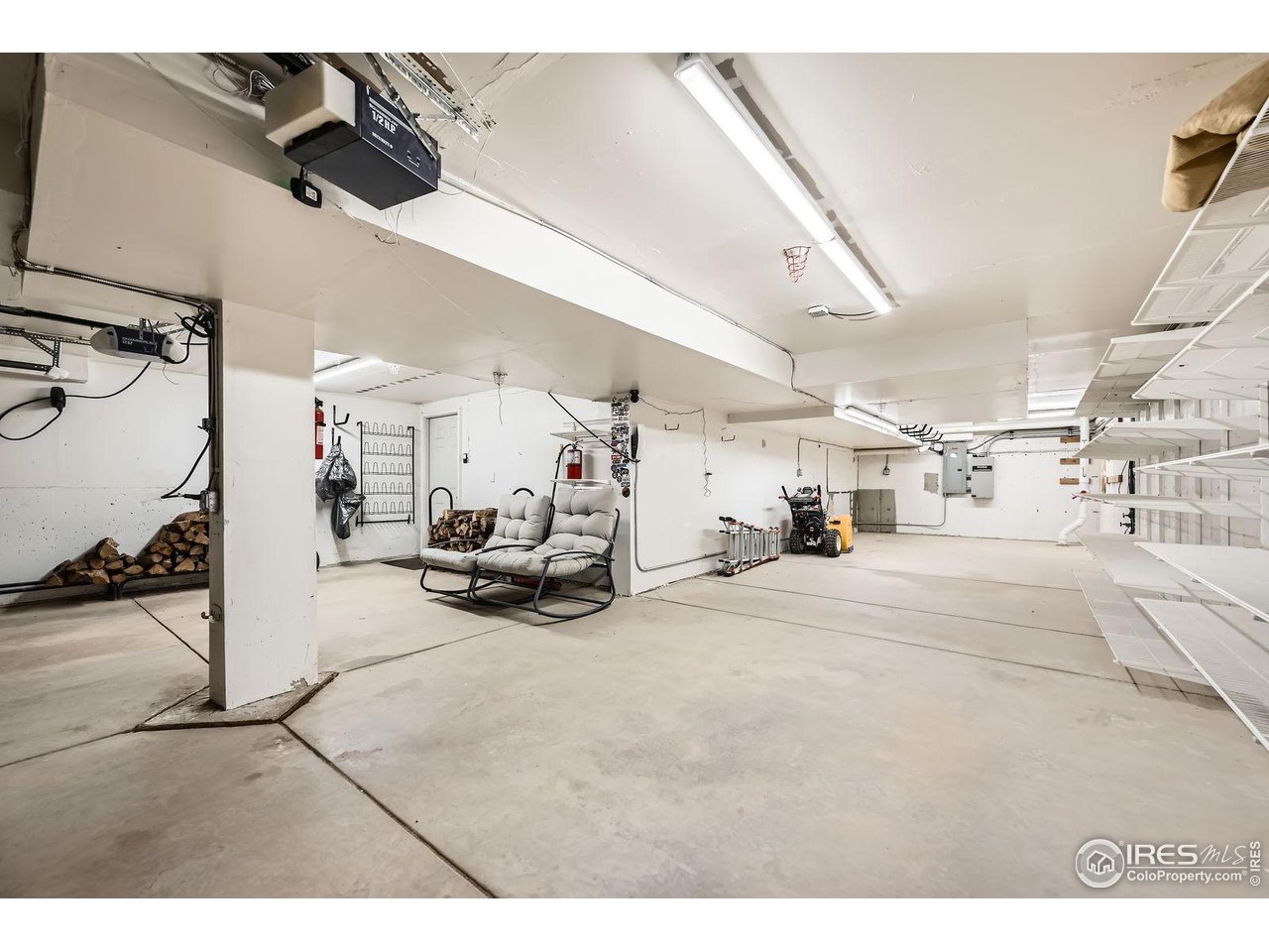 613 Ranch Road Ward, CO 80481 - Photo 19 of 37 Huge 3-car tandem garage! Store an extra vehicle or turn the back area into a workshop. EV turbo charging station already installed!