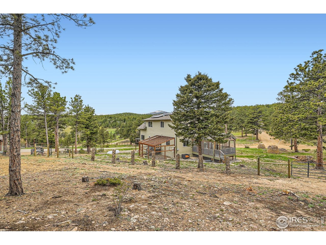 613 Ranch Road Ward, CO 80481 - Photo 23 of 37 Backyard area is fully fenced (Property has .77 acres)