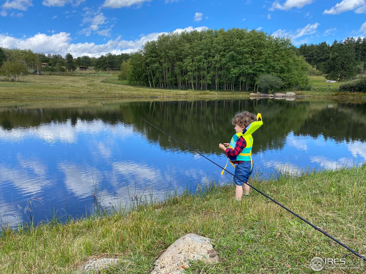 613 Ranch Road Ward, CO 80481 - Photo 35 of 37 Fishing at Valley Lake in the summertime (Part of the Bar-K Association)