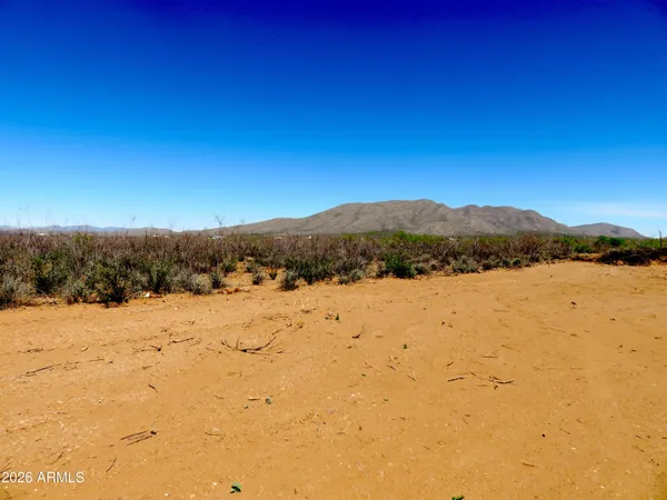 a view of lake and mountain