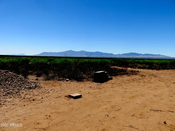 a view of a lake with a mountain