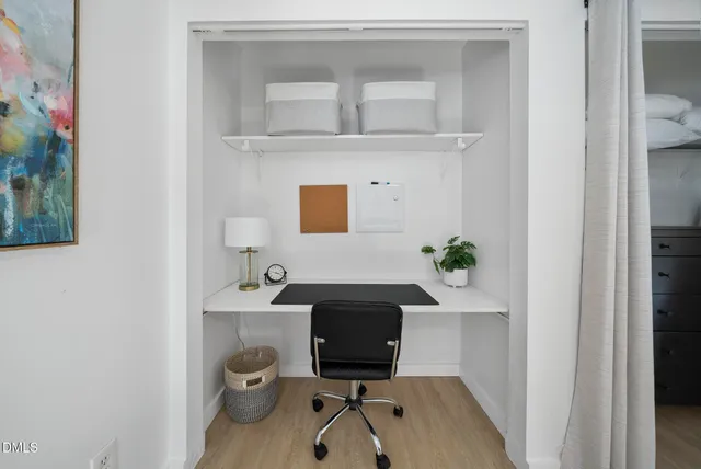 a view of workspace with a potted plant