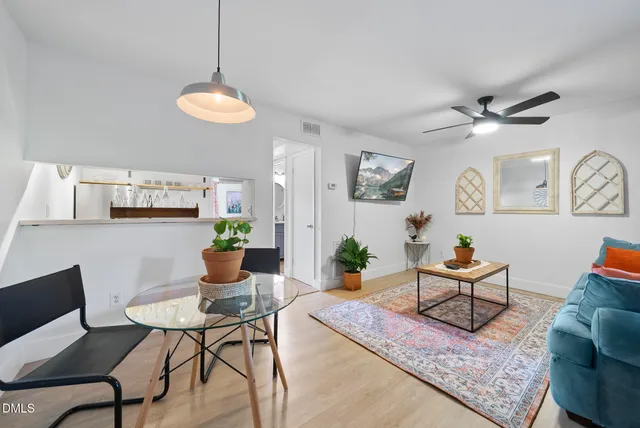 a living room with furniture and a table