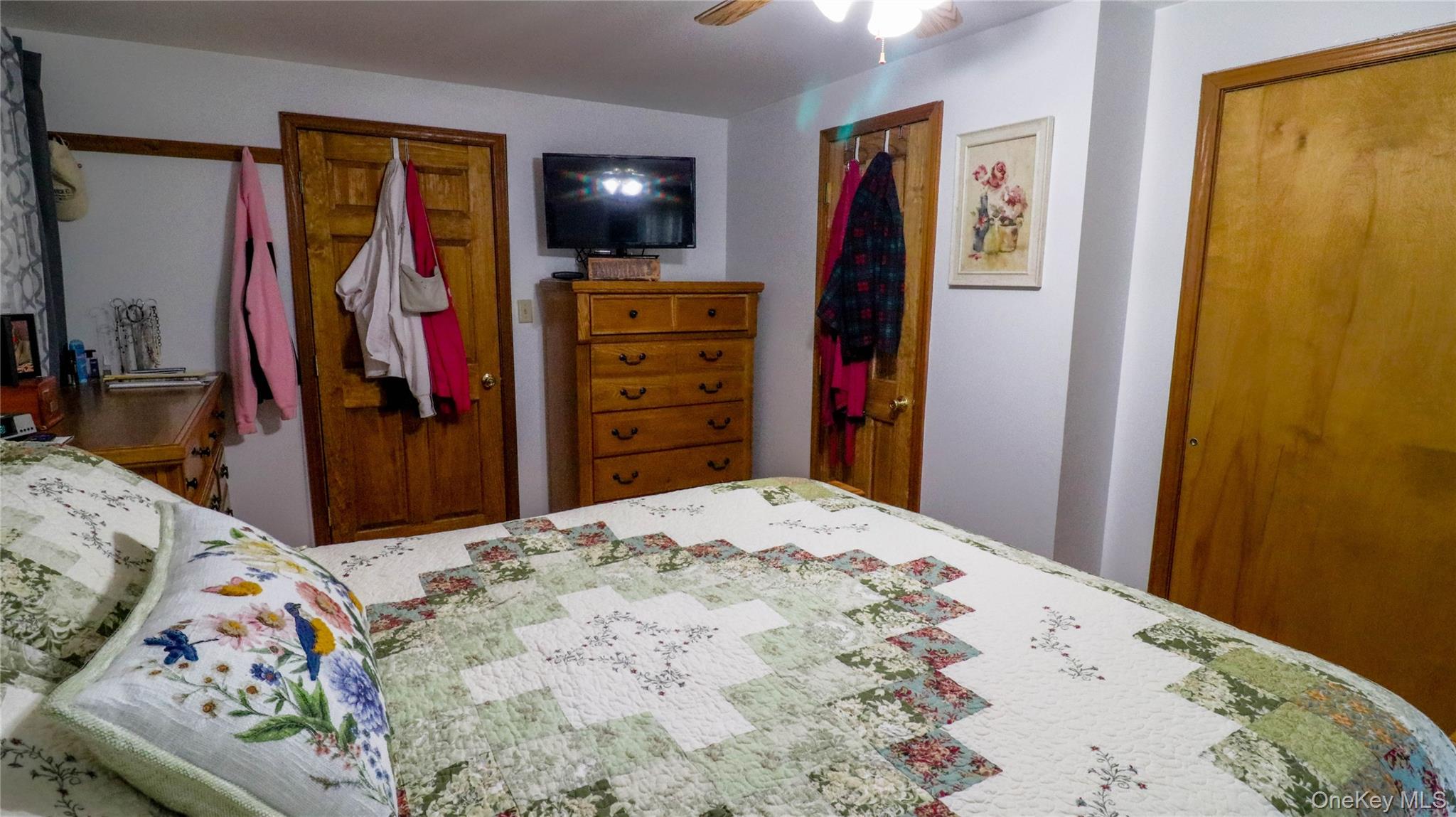 11 Hood Road Roscoe, NY 12776 - Photo 18 of 35 a bedroom with a bed and a flat screen tv