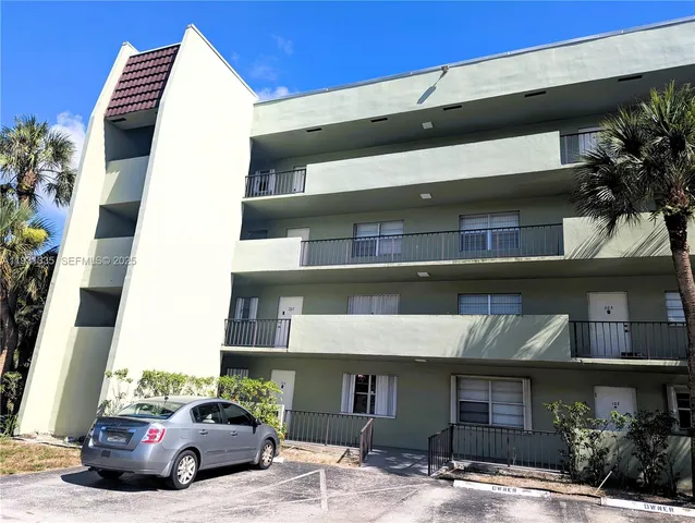 a car parked in front of a building