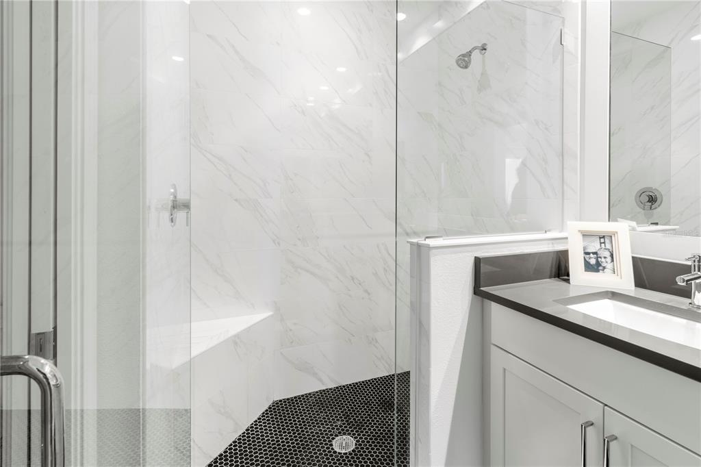 10520 Boardwalk Loop, Unit 302 Bradenton, FL 34202 - Photo 25 of 45 a bathroom with a sink and a mirror