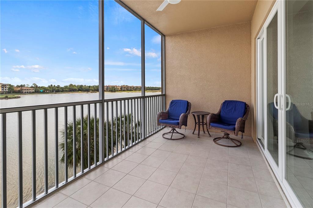 10520 Boardwalk Loop, Unit 302 Bradenton, FL 34202 - Photo 34 of 45 a building outdoor space with seating space and outdoor seating