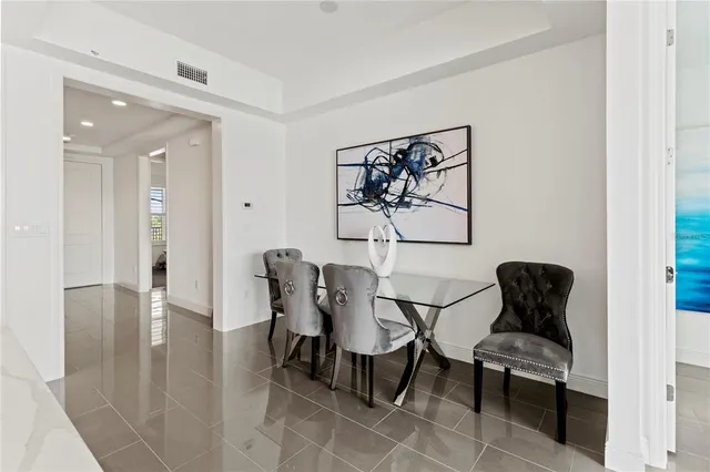 a view of a livingroom with furniture and wooden floor