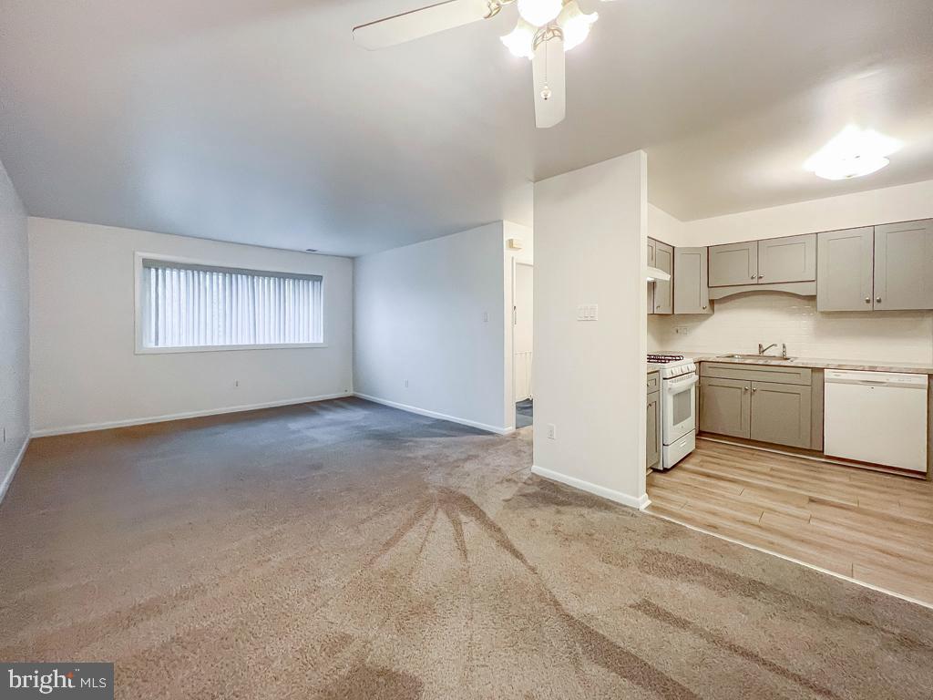 10843 Academy Road Philadelphia, PA 19154 - Photo 27 of 44 a view of a kitchen with a sink cabinets and a window