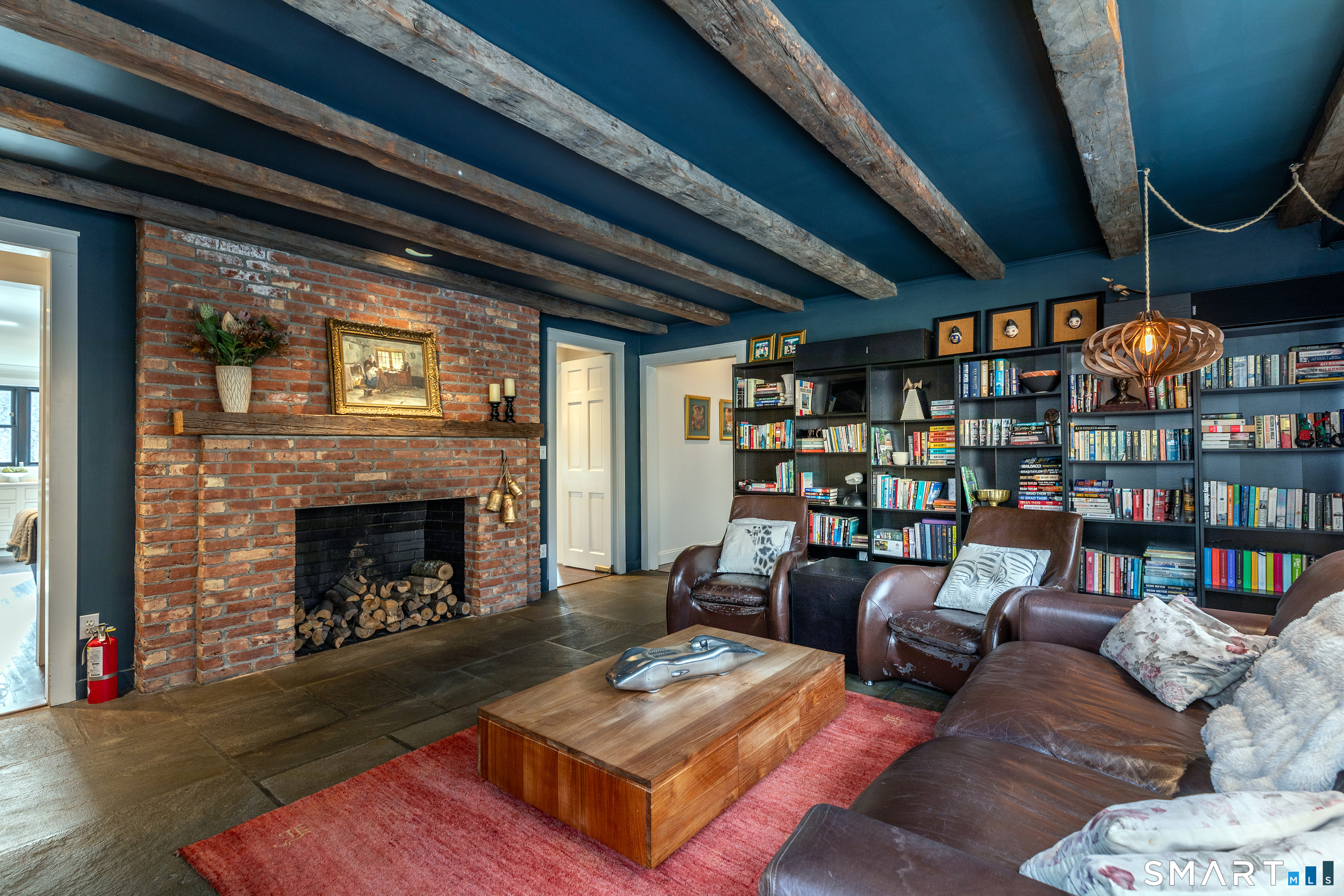 1030 Washington-Woodbury Road Roxbury, CT 06783 - Photo 22 of 40 a living room with furniture and a fireplace