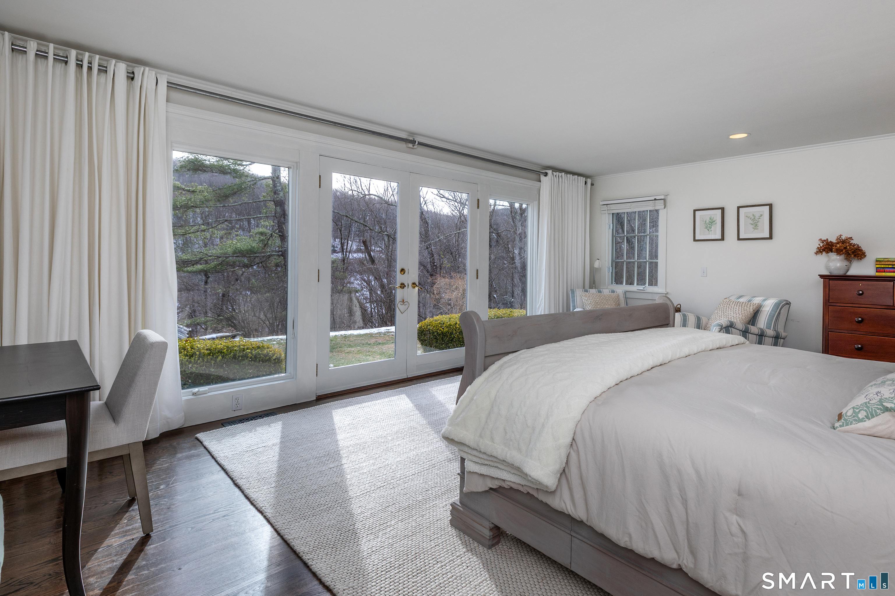 1030 Washington-Woodbury Road Roxbury, CT 06783 - Photo 26 of 40 a bedroom with a bed and large window