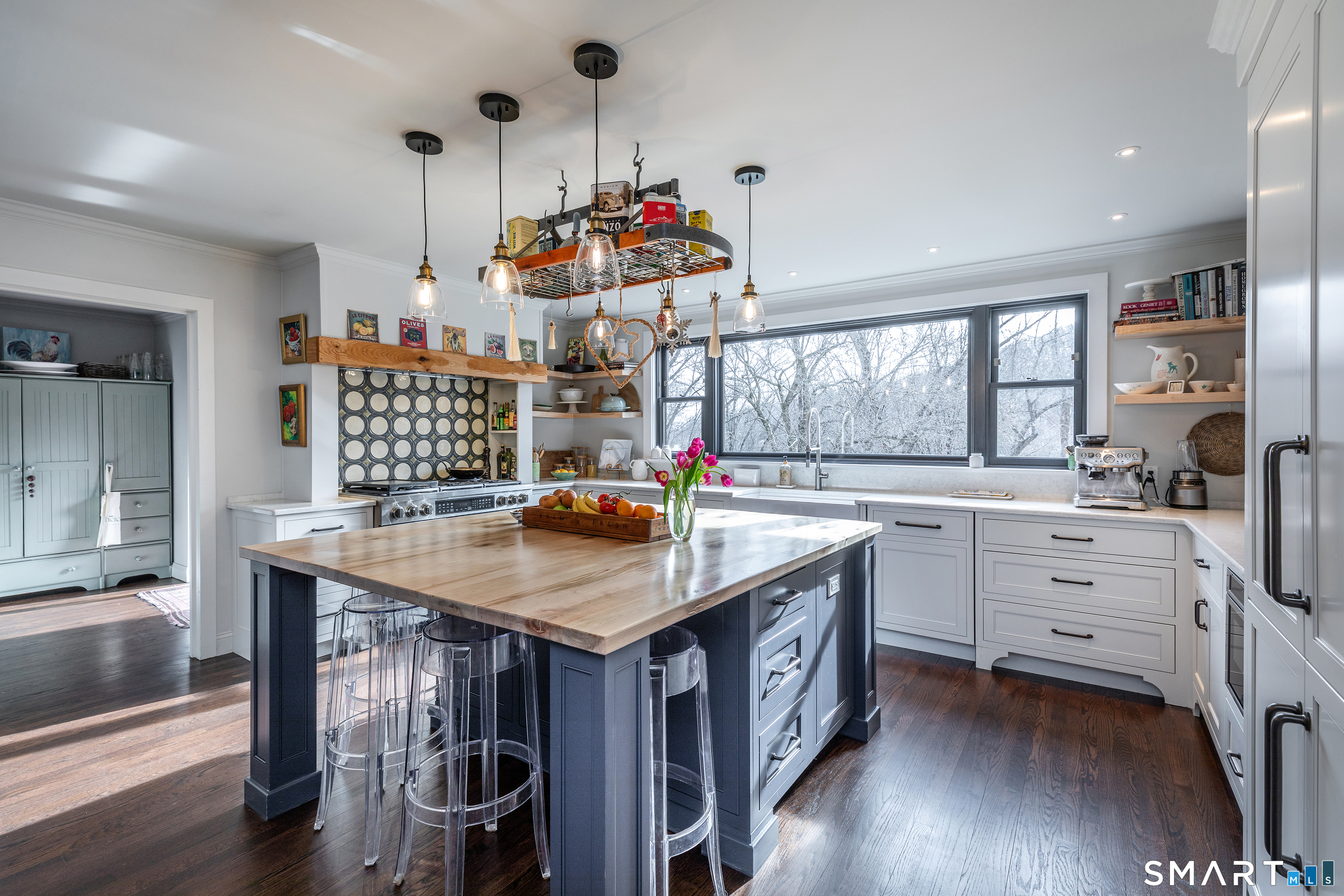 1030 Washington-Woodbury Road Roxbury, CT 06783 - Photo 9 of 40 a kitchen that has a lot of cabinets in it and wooden floors