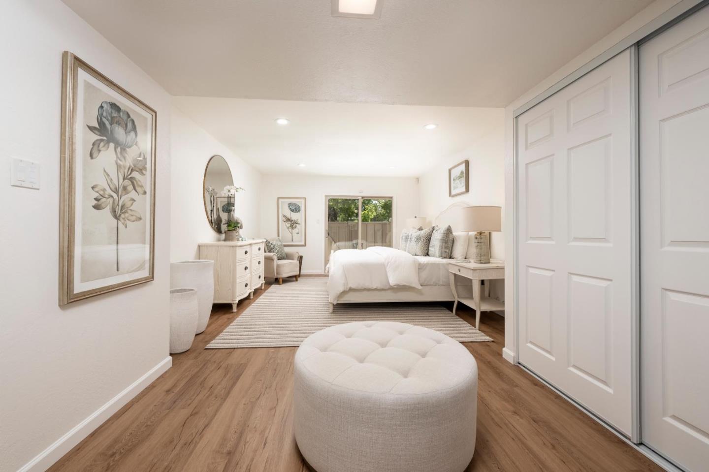 38 Weepingridge Court San Mateo, CA 94402 - Photo 12 of 25 a spacious bedroom with a bed and a large window