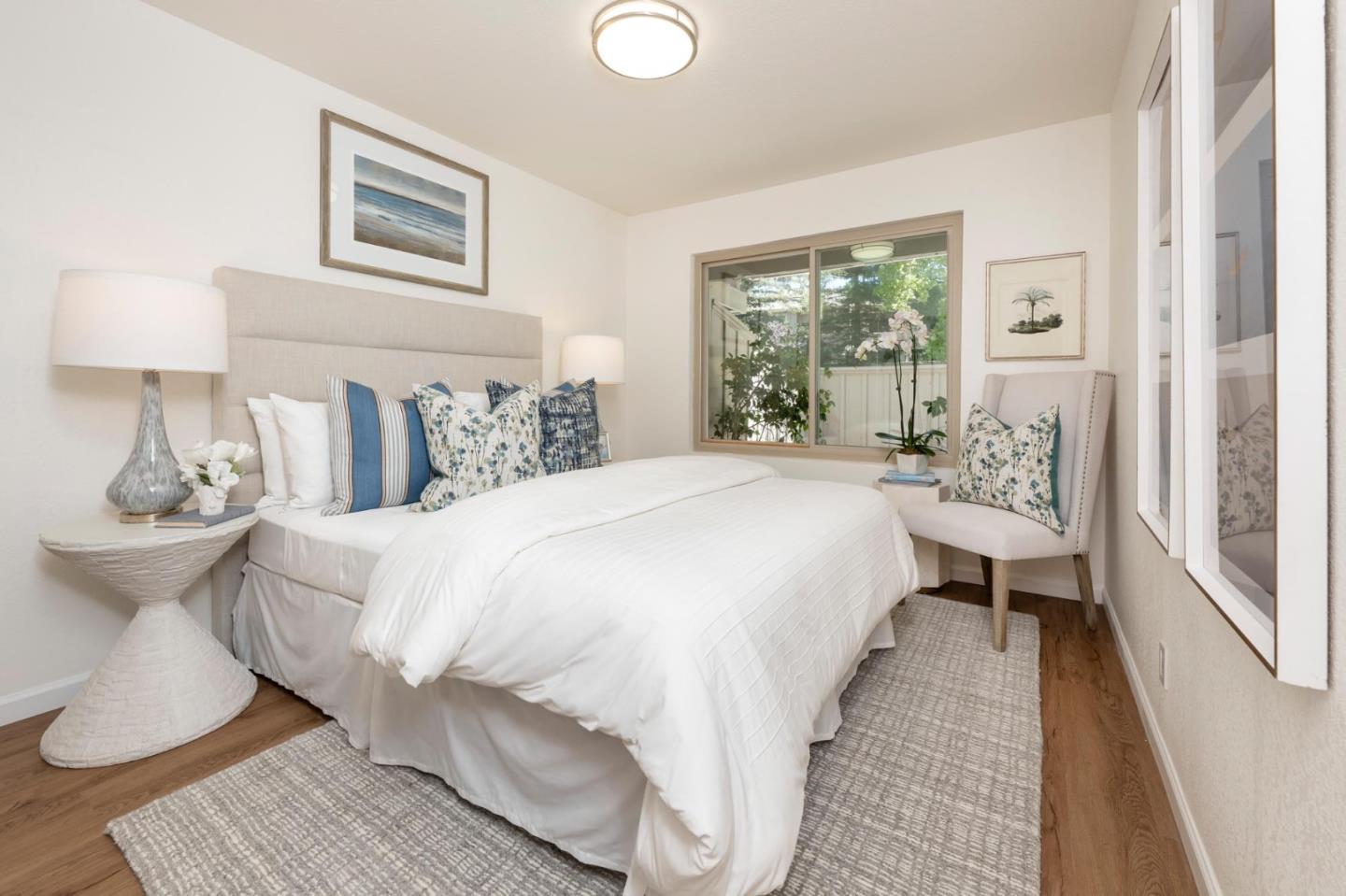 38 Weepingridge Court San Mateo, CA 94402 - Photo 14 of 25 a spacious bedroom with a bed and a large window