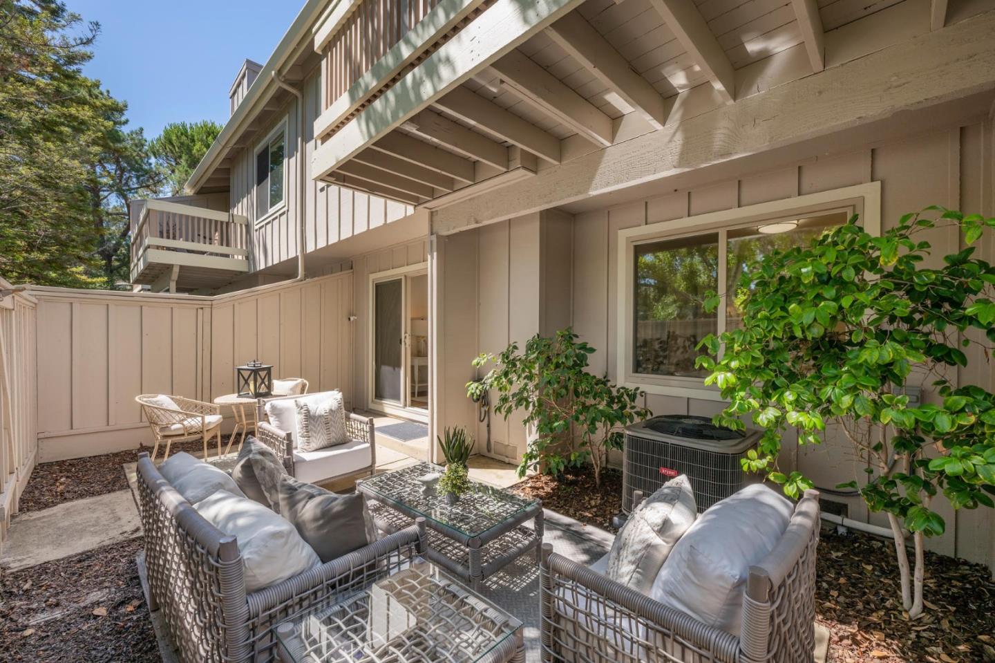 38 Weepingridge Court San Mateo, CA 94402 - Photo 17 of 25 a view of a patio with couches table and chairs and potted plants