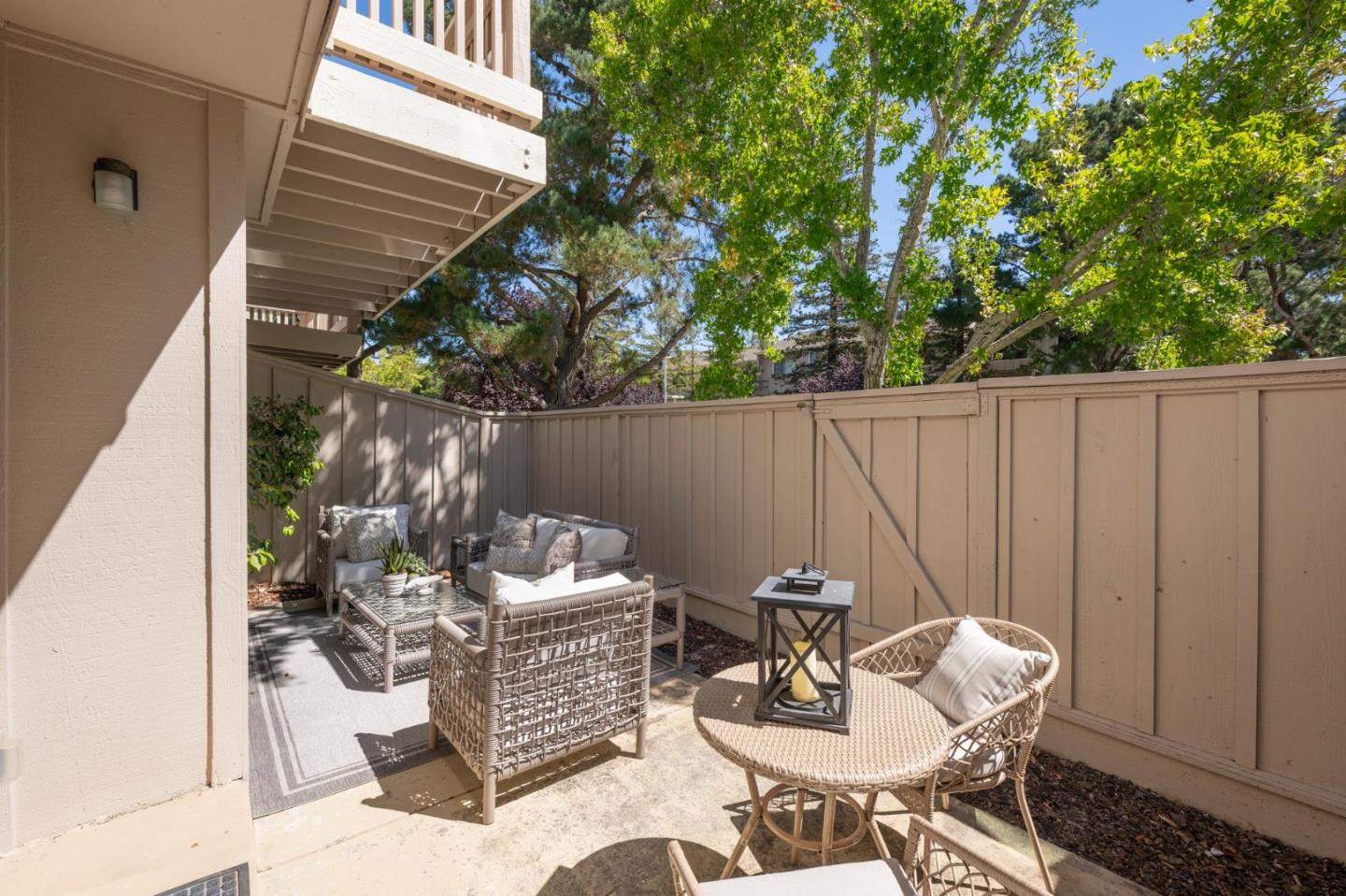 38 Weepingridge Court San Mateo, CA 94402 - Photo 18 of 25 a view of a patio with table and chairs and potted plants