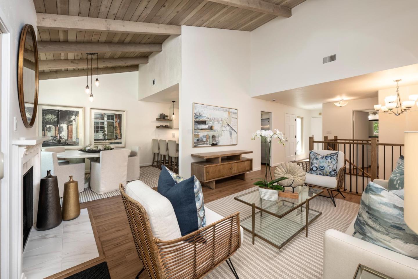 38 Weepingridge Court San Mateo, CA 94402 - Photo 2 of 25 a living room with fireplace furniture and a table
