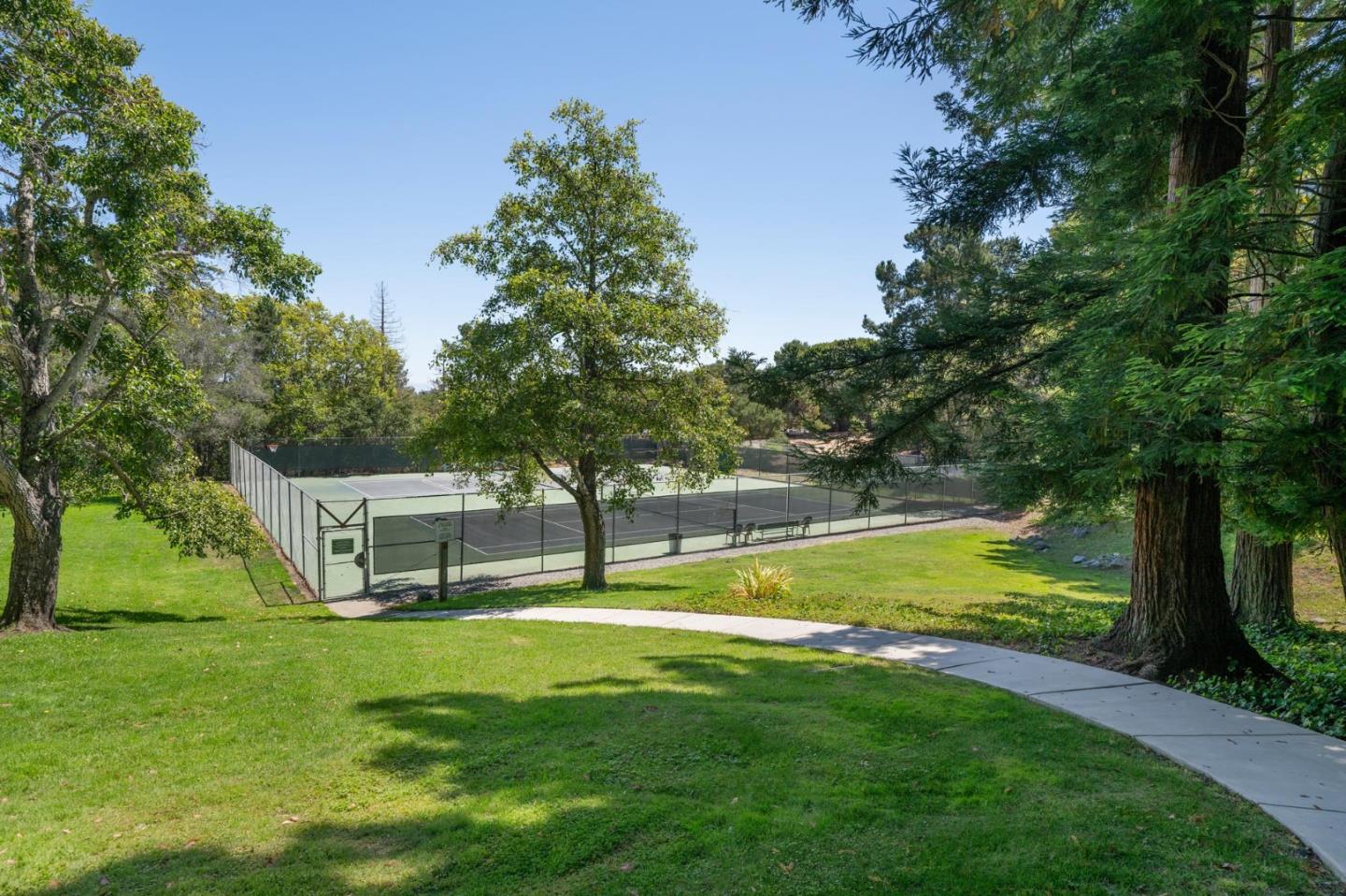 38 Weepingridge Court San Mateo, CA 94402 - Photo 23 of 25 a view of a swimming pool with a yard