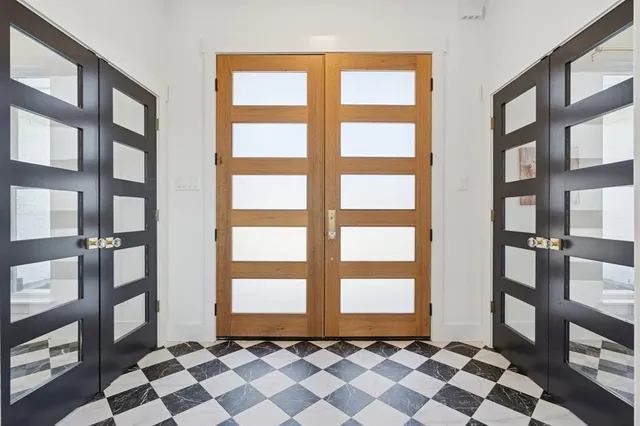 a view of a room with windows