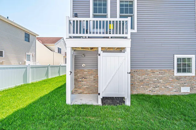 a view of an empty room and garage