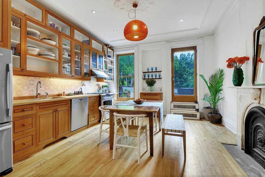 368 5th Street Brooklyn, NY 11215 - Photo 3 of 15 a view of a dining room with furniture window and wooden floor