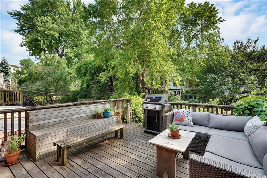 368 5th Street Brooklyn, NY 11215 - Photo 4 of 15 a balcony with wooden floor and furniture