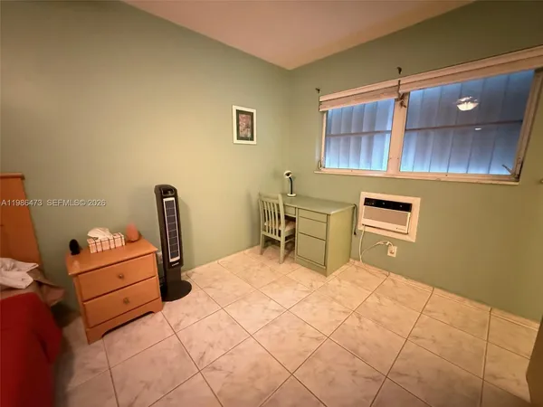 a workspace with furniture and window