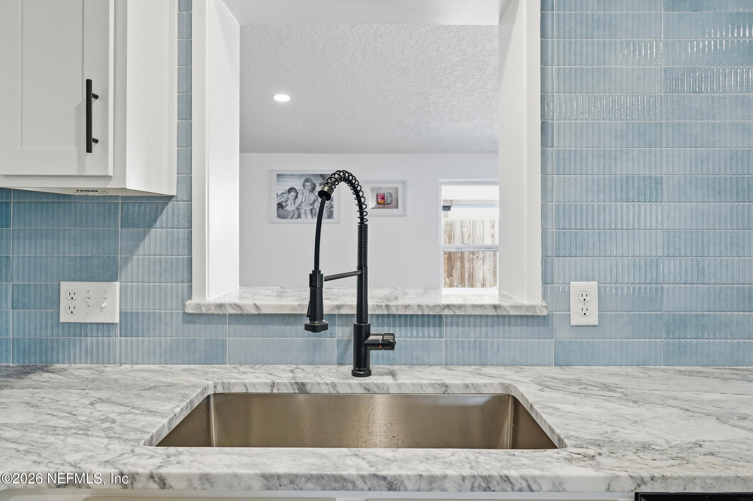 785 Triton Road Atlantic Beach, FL 32233 - Photo 12 of 54 a kitchen with a sink cabinets and window