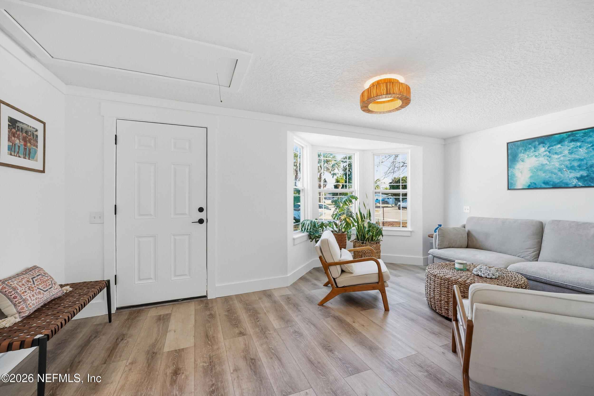 785 Triton Road Atlantic Beach, FL 32233 - Photo 17 of 54 a living room with furniture and a window