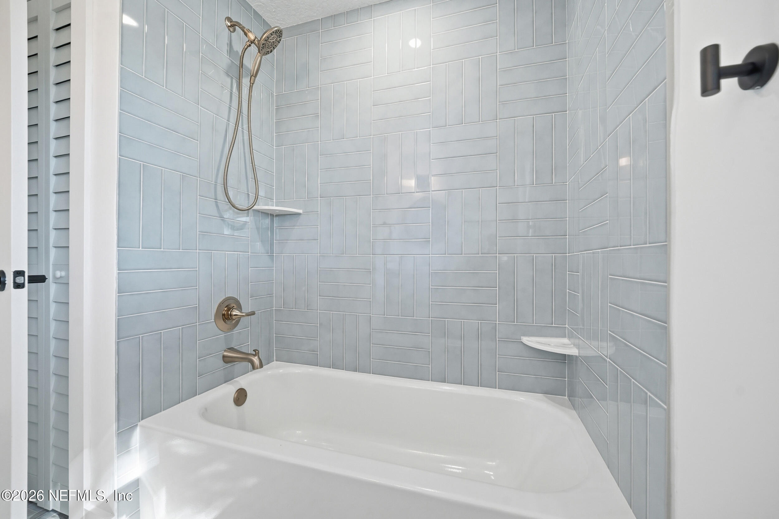 785 Triton Road Atlantic Beach, FL 32233 - Photo 28 of 54 a white bath tub sitting next to a white sink