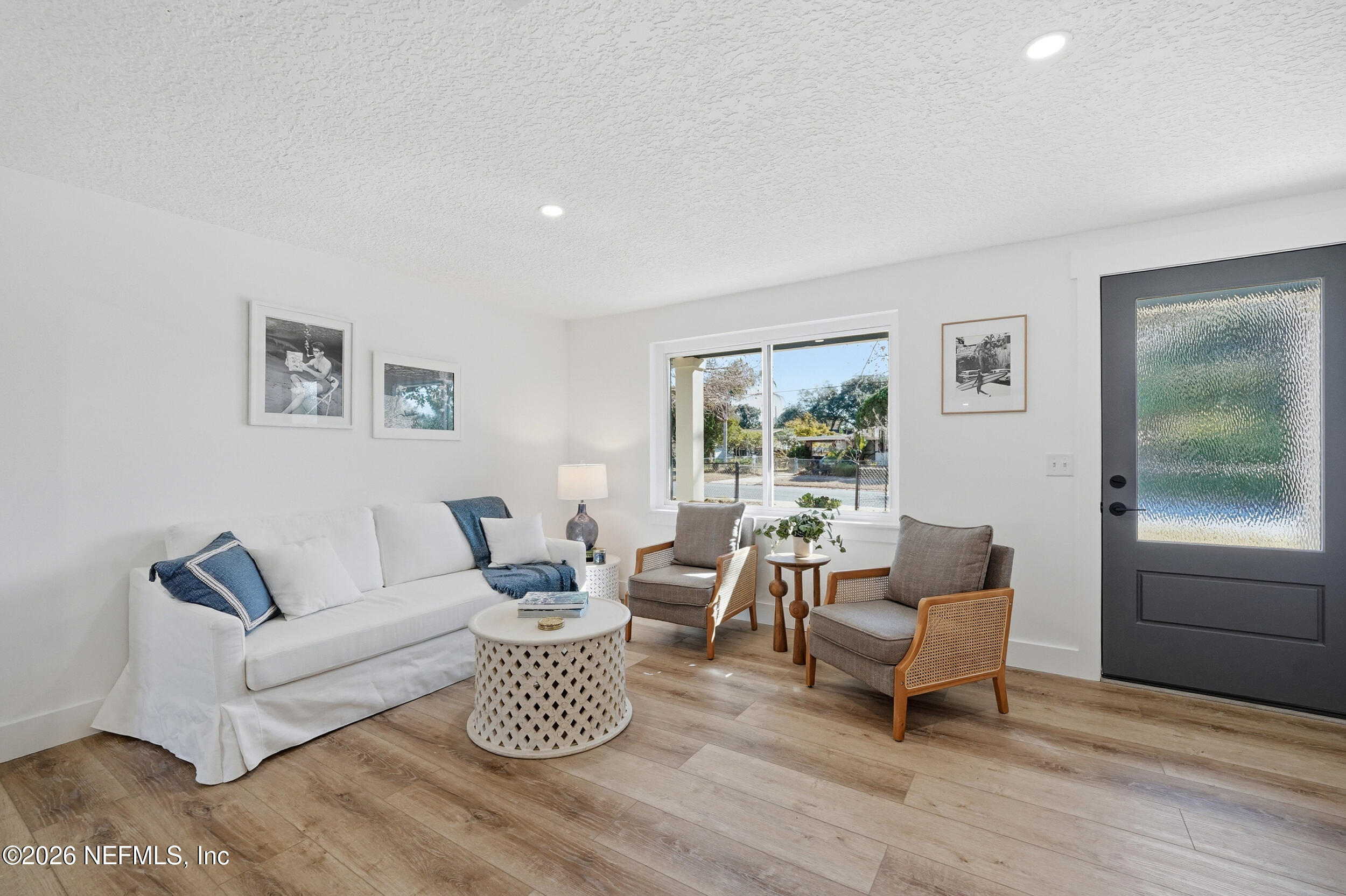 785 Triton Road Atlantic Beach, FL 32233 - Photo 3 of 54 a living room with furniture and a potted plant on table