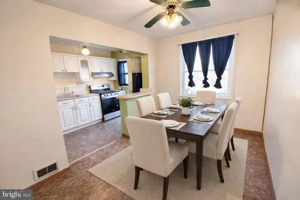 a view of a dining room with furniture