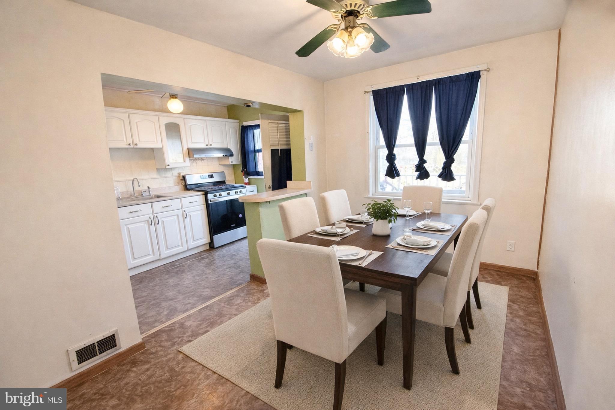 8418 Kavanagh Road Baltimore, MD 21222 - Photo 4 of 24 a view of a dining room with furniture