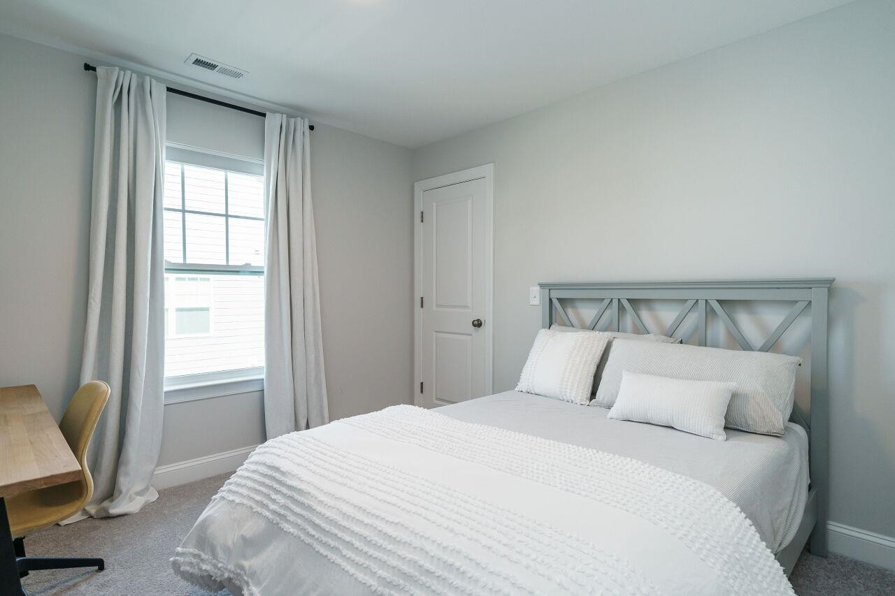 136 Rostova Way Holly Springs, NC 27540 - Photo 26 of 42 Secondary Bedroom