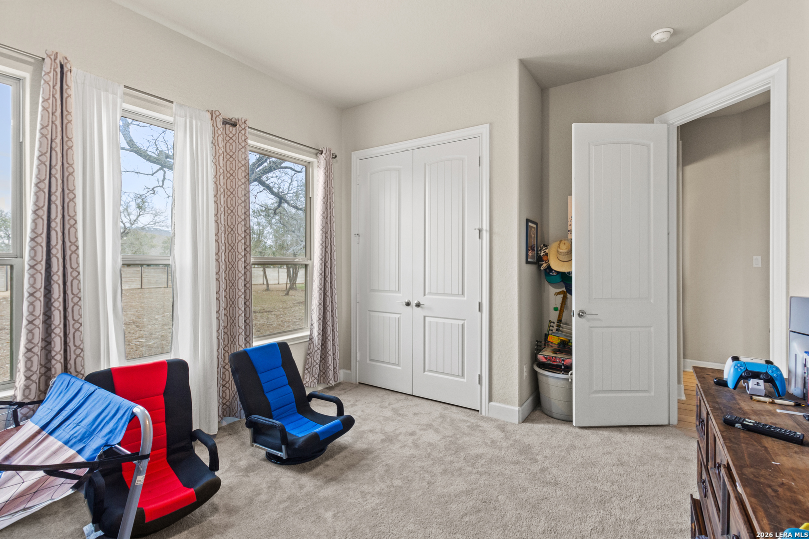 527 James Way Castroville, TX 78009 - Photo 20 of 32 a living room with furniture and a window