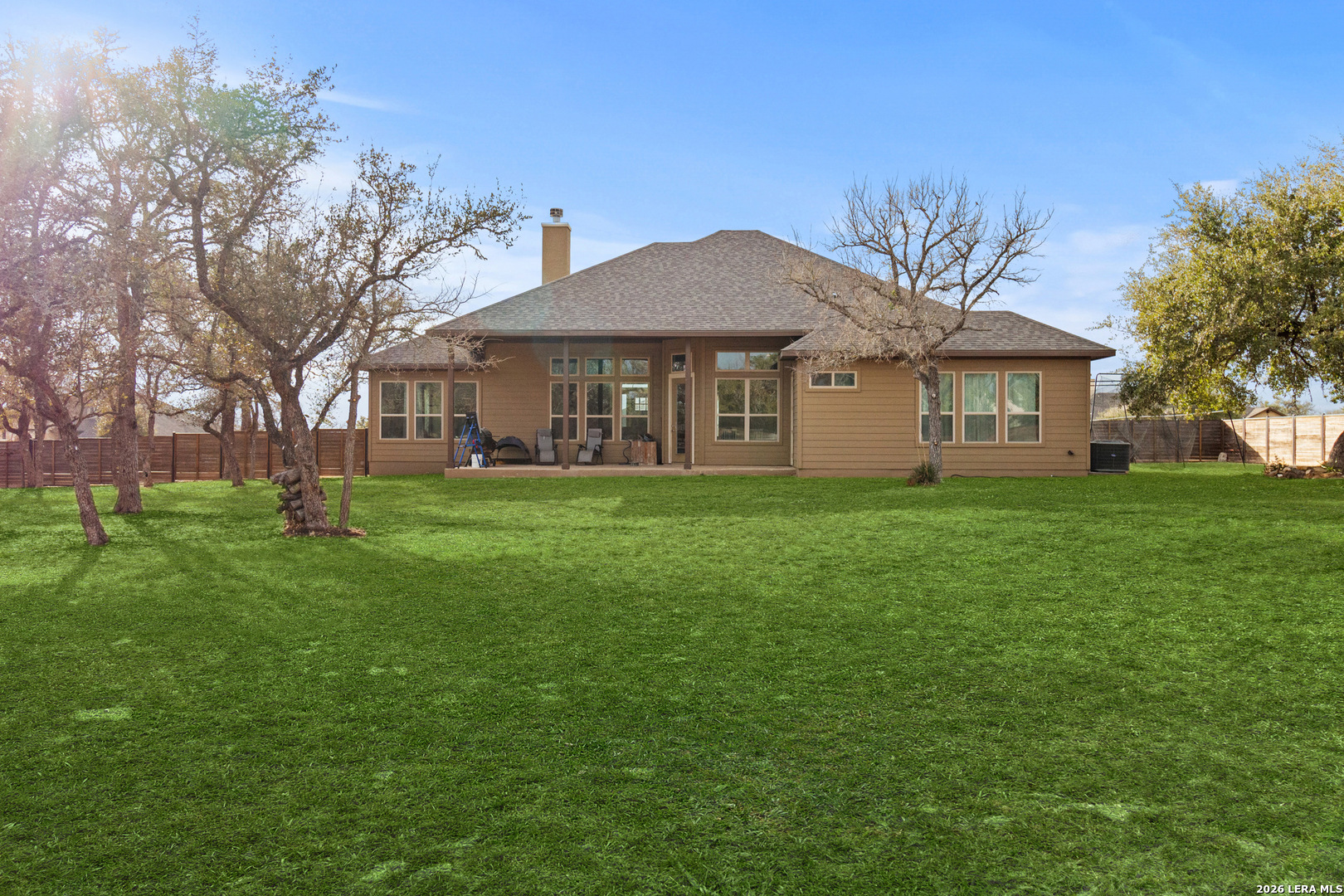 527 James Way Castroville, TX 78009 - Photo 23 of 32 a front view of house with yard and green space