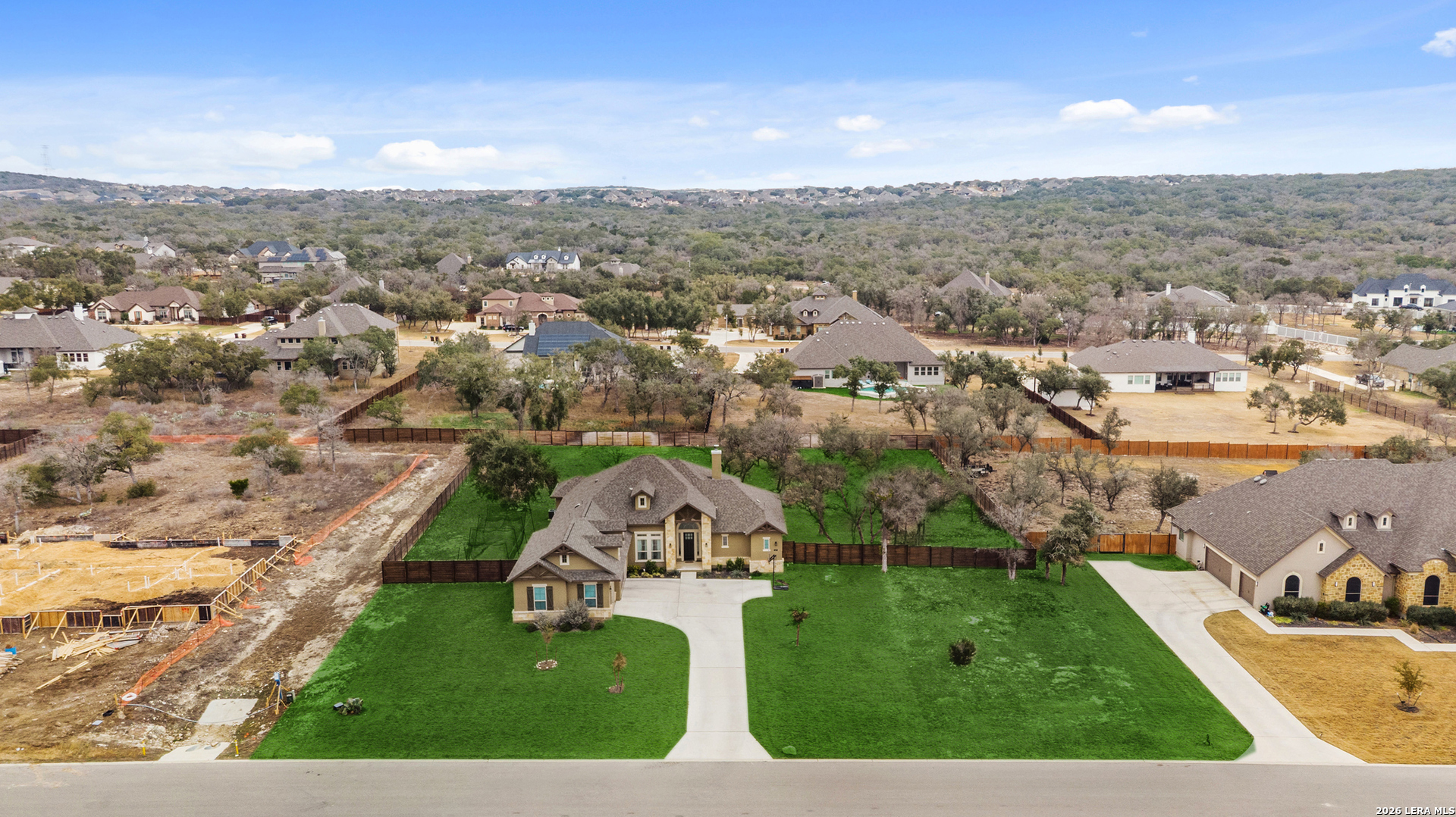 527 James Way Castroville, TX 78009 - Photo 25 of 32 an aerial view of residential houses with outdoor space and trees