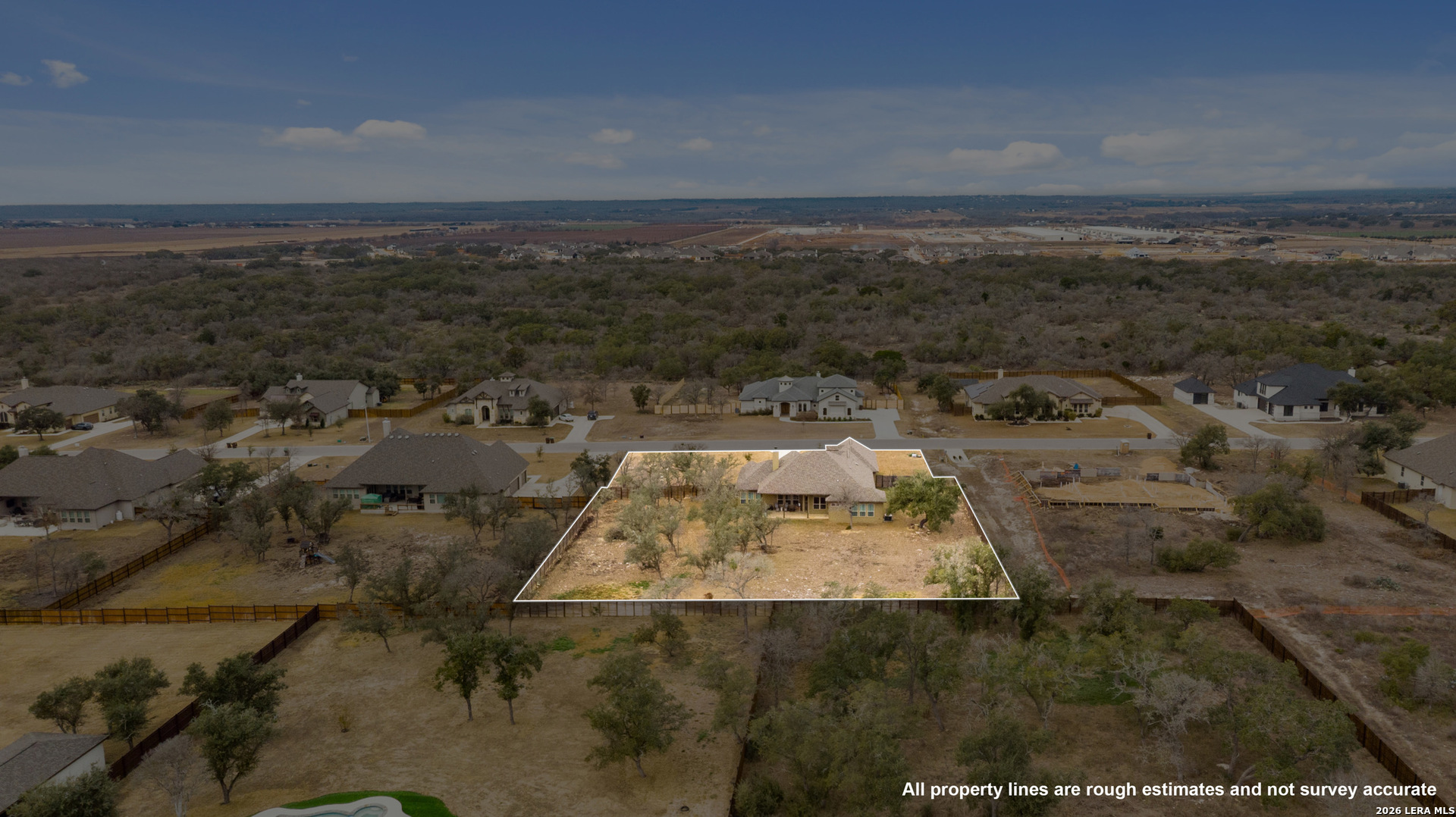 527 James Way Castroville, TX 78009 - Photo 30 of 32 an aerial view of residential houses with outdoor space
