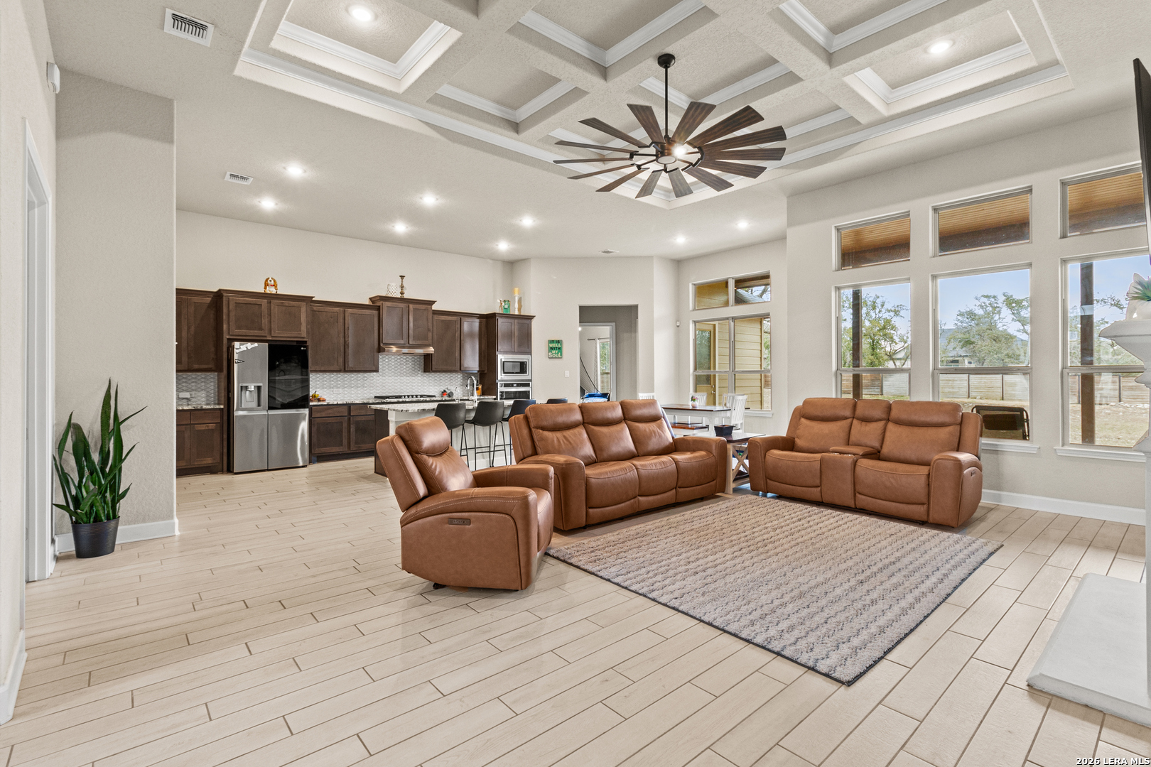 527 James Way Castroville, TX 78009 - Photo 6 of 32 a living room with furniture and a large window