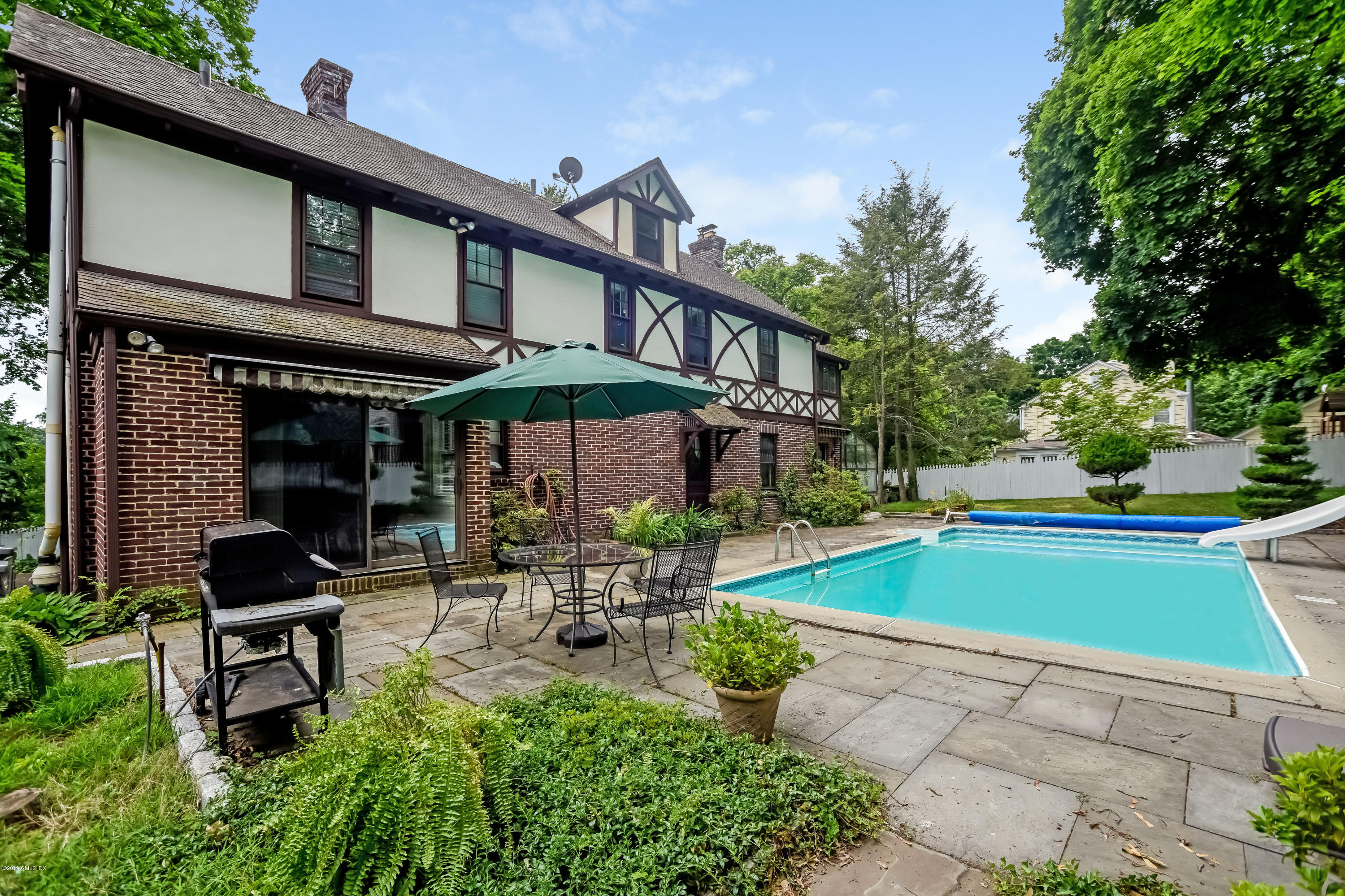 12 Old Post Road Cos Cob, CT 06830 - Photo 26 of 34 a view of a house with swimming pool and sitting area