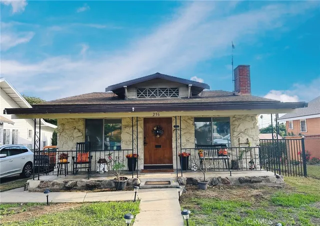 a view of a building with sitting area