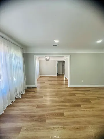 a view of an empty room and window