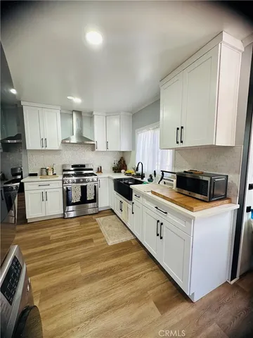 a large kitchen with cabinets