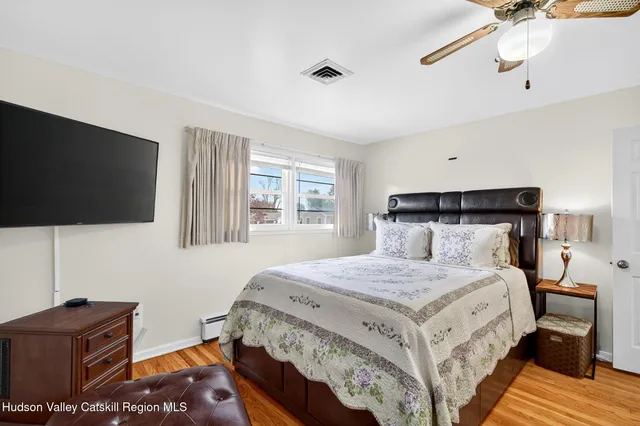 a bathroom with a sink double vanity and a mirror