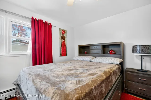 a bathroom with a shower and a sink